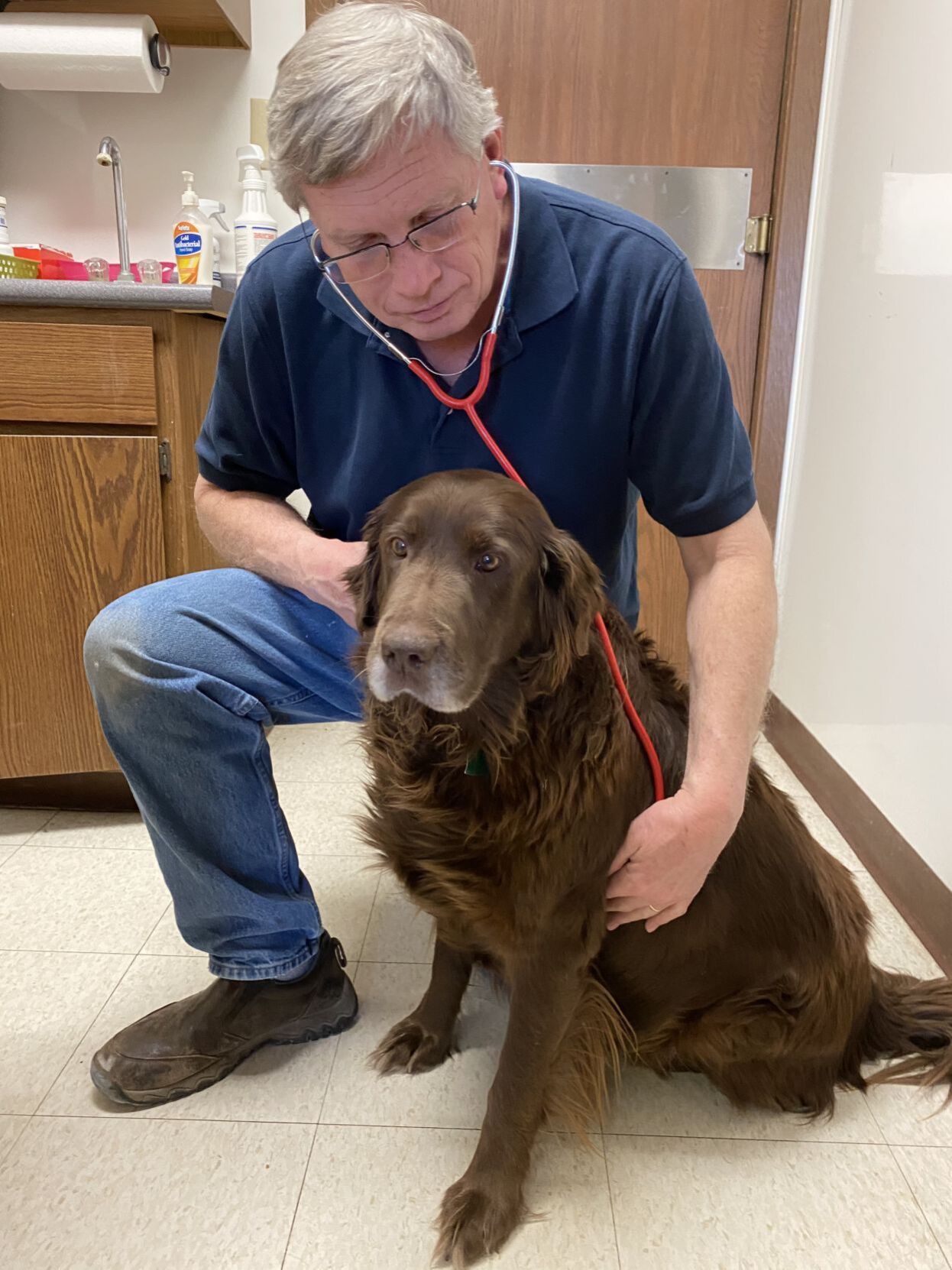 Dr. Gene Fjeld with canine.jpeg